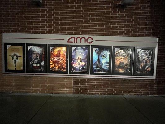 Movie posters outside AMC Cicero 14 Dec 2022.