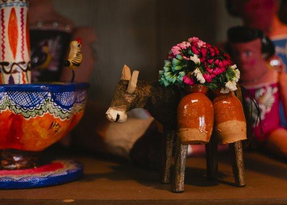 Hand carved burros at Zócalo Village.