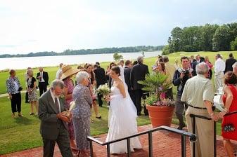 Out door patio and lawn are easily accessible from cocktail room and reception room