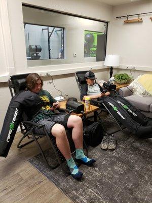 Athletes enjoying our Recovery Lounge