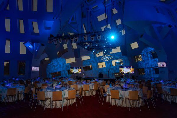 Corporate Event at unique venue - A/V, branding, room and table decor