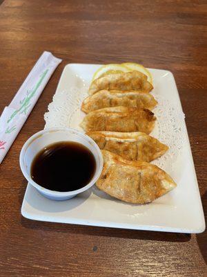 Gyozas with ponzu and lemon