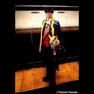 FULTON STREET subway station. Manhattan, NY. Dr. Takeshi Yamada & Seara (Coney Island sea rabbit). The quiet station platform at night.