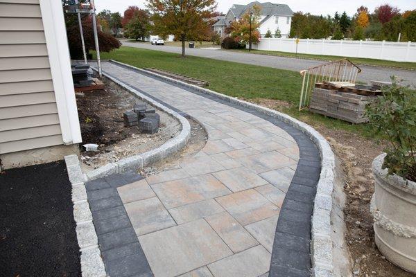 Portico, driveway, and front walk-way in Shoreham, NY.