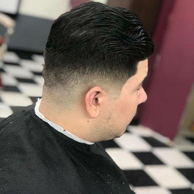 Low bald fade with combback