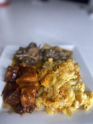 Southern Mac and cheese with sweet candy yams and oxtail