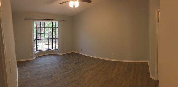 Master bedroom - installation of porcelain tile and baseboards