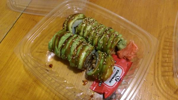 Delish Dynamite roll with avocado on top!