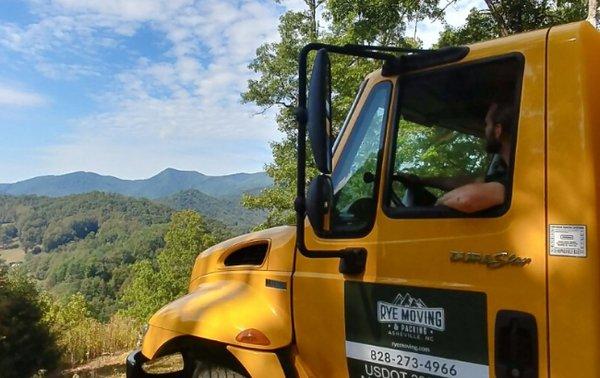 Owner, Logan Rye, overlooks our beautiful mountains after a move.