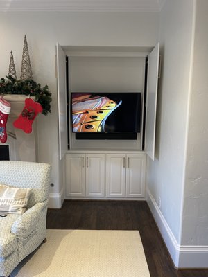 TV installation installed inside cabinet.