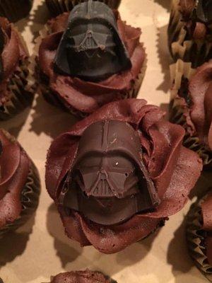 The original Double Darth chocolate cupcake, with a white-chocolate helmet.