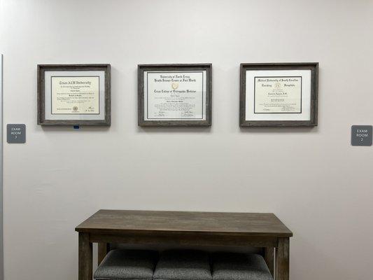 Interior wall with diplomas