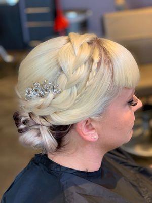 Formal bridal style with braids.