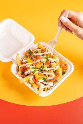 EXTREME FRIES
 Fries loaded with your choice of Protein, Queso & Fresh Veggies