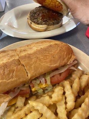 The burger on top and steakish cheese on bottom