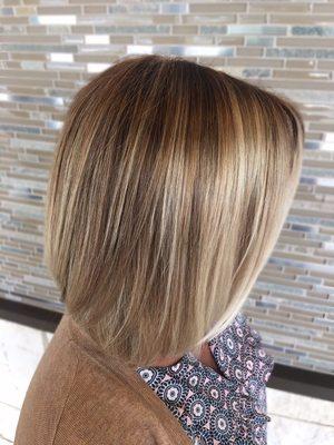 Full foil mixed with highlights and lowlights to create depth within the hair.