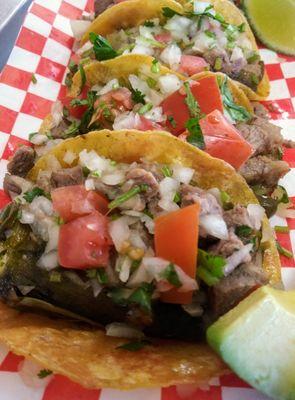 Mini Rellenos..
Jalapenos stuffed with cheese and Asada, topped with pico de gallo wrap in a mini corn tortilla, served with Charro beans.