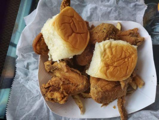 Chicken wing fries and dinner rolls