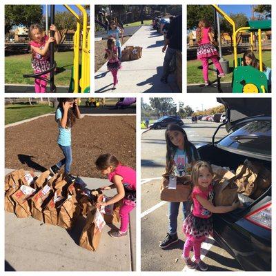 Day off from work but never a day off from helping others in need.Playing at a park & passing out grocery bags to families.Teach them young