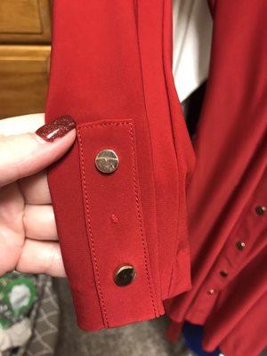 $160 dress that this place ripped a button off and won't find the missing button in the back.