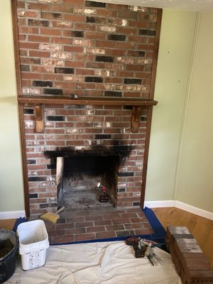 waiting for gas fireplace insulation with stacked tile and mantle