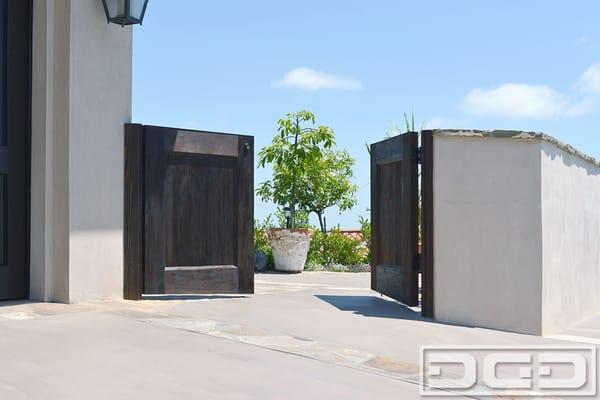 Rancho Palos Verdes custom designed garden gates in a Spanish Mediterranean Style for a newly renovated custom home.