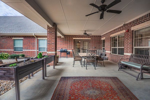 Elk Creek Assisted Living and Memory Care | Burleson, TX | Patio with raised gardening beds