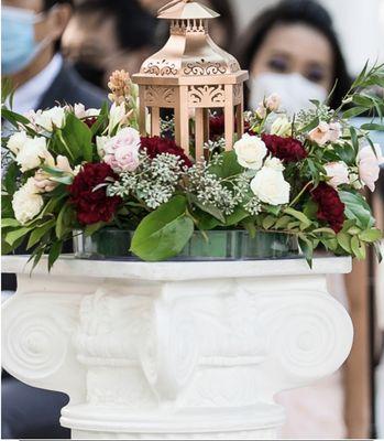 "Corrected" Ceremony & Reception Centerpieces with red carnations instead of roses, no orangey-pink roses. Still some white flowers.