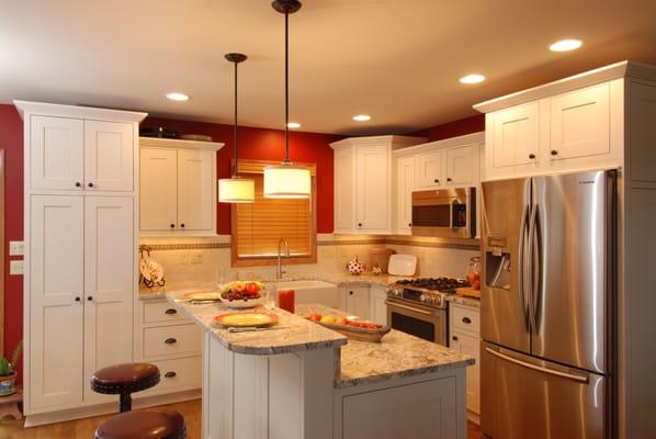 Kitchen remodel project, granite countertops, farm sink, and an island perfect for seating.