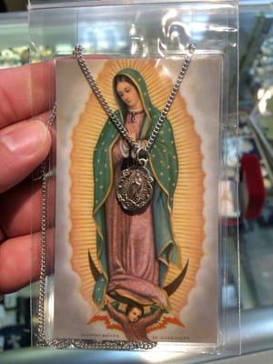 I bought this beautiful pendant for my scapular :)