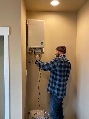 Installing a gas tankless water heater. Great for small spaces and ADU's!!