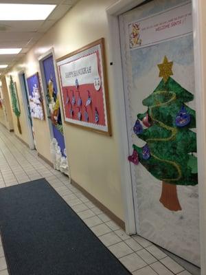 Classroom door and halls are always decorated by the children's artwork.