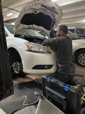 Here's Darius Replacing a Air Condition compressor on A Nissan