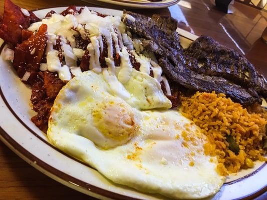 Chilaquiles, eggs over medium, and carne Asada