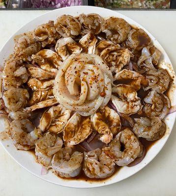 Shrimp and Scallops with our unique seafood sauce.