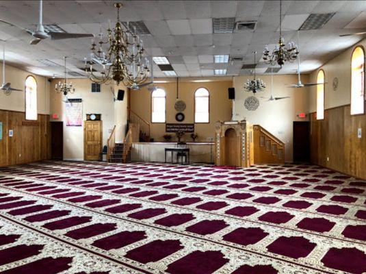 This is men's prayer hall area, pronounced mussella in Arabic. It is where the five congregational prayers are held daily in the Mosque.