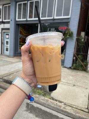 Iced vanilla latte with oat milk