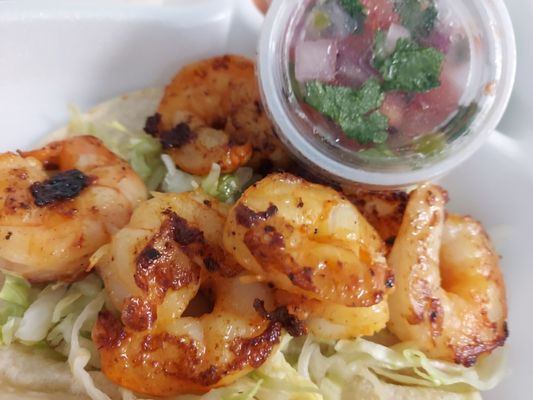 Shrimp tacos, a bit salty.