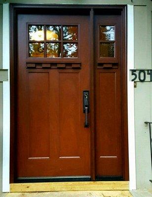 Door installation. Mission style single entry door with sidelite.