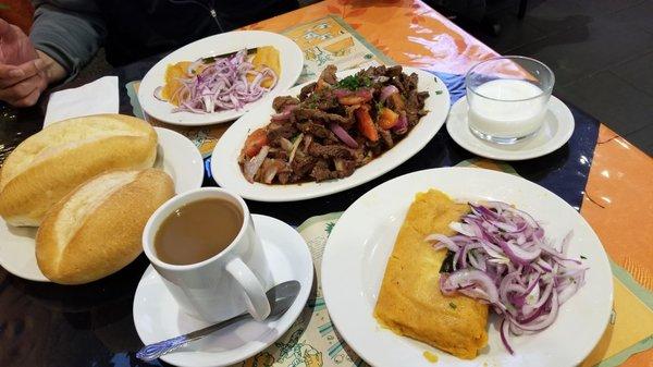 Tamales, lomo al jugo platter, coffee. The flan came later