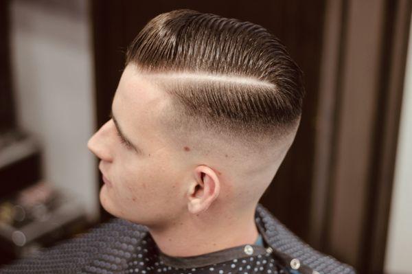 Clean cut and Comb. Styled with a water based pomade for easy shampooing.