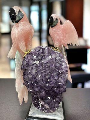 This avian masterpiece harmonizes two sacred 
 crystals into an exquisite sculpture.