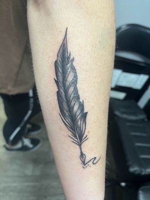 Feather quill tattoo