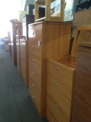 A lot of wood colored furniture