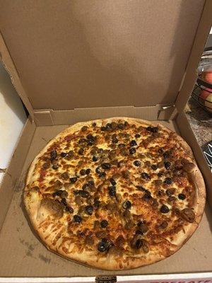 Light sauce, black olive, sausage pizza! Actually pretty good.