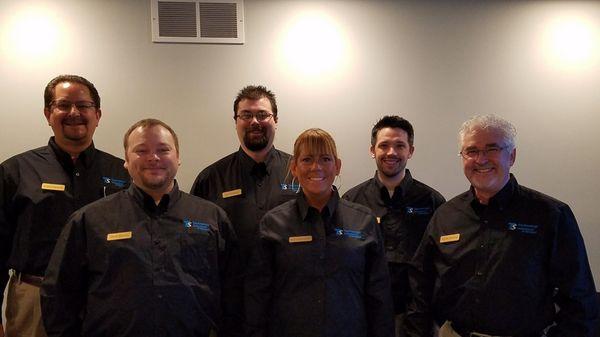 We had a lot of fun showing you our new office space at our open house in March! We took this group photo the night of the open house.