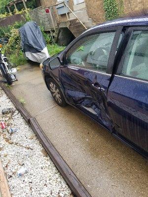 This was immediately after the accident. The car door was jammed shut. Once opened it wouldn't even close.