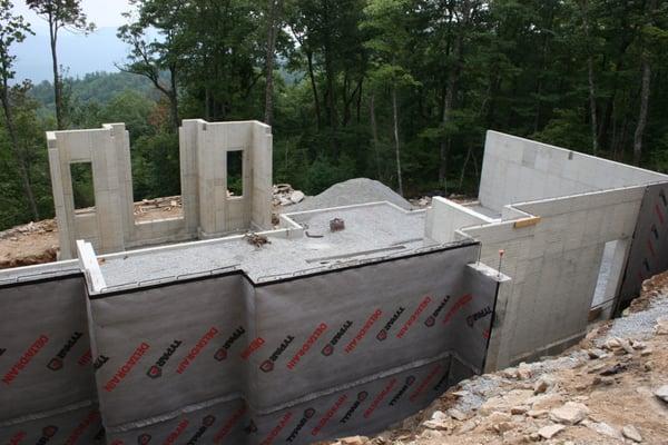 Poured concrete wall foundation by K-Wall Poured Walls, LLC. Walls range from 6' tall to 22' tall!