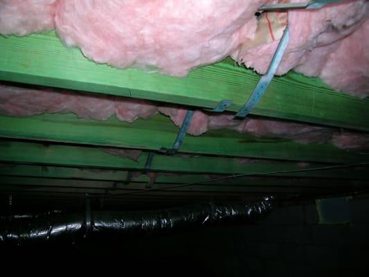 Crawlspace after remediation with MoldBlock applied.