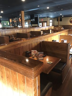 Remodel for Outback steakhouse installing new divider walls new floors lights and booths